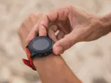 Step-by-step instructions on how to change the time on a Shark watch, demonstrating the process with clear visuals.