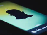 Snapchat's dark mode interface with black and gray tones- how to change your snapchat to dark mode