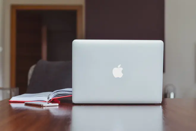 A person demonstrating the process of how to delete all messages on Mac