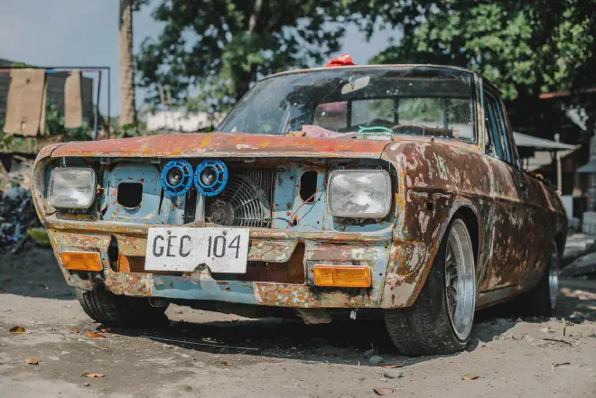 Image of a rusty car illustrating the effects of corrosion