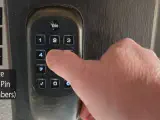 Step-by-step guide on how to change a Yale lock code.
