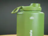 Step-by-step guide showing the process of how to clean a HydroFlask water bottle.